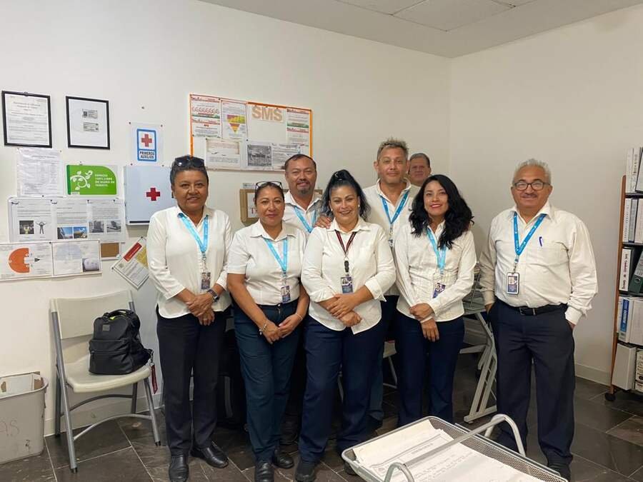 SATISERCOM operations and administrative staff at a station office