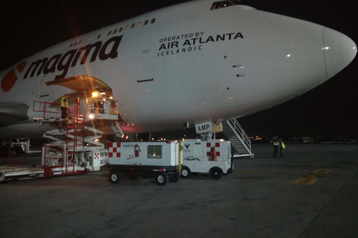 Freighter aircraft being loaded with a hi-loader